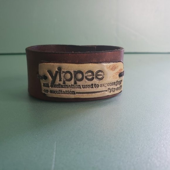 Leather cuff bracelet with ceramic piece reading "yippee ... - Picture 7 of 7